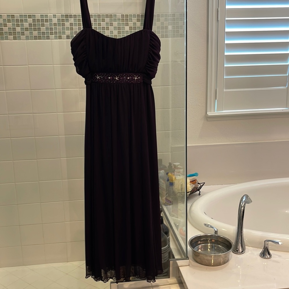 Corrected beautiful dark purple dress. Size 16. New with tags.